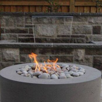 fire and water feature in backyard landscape